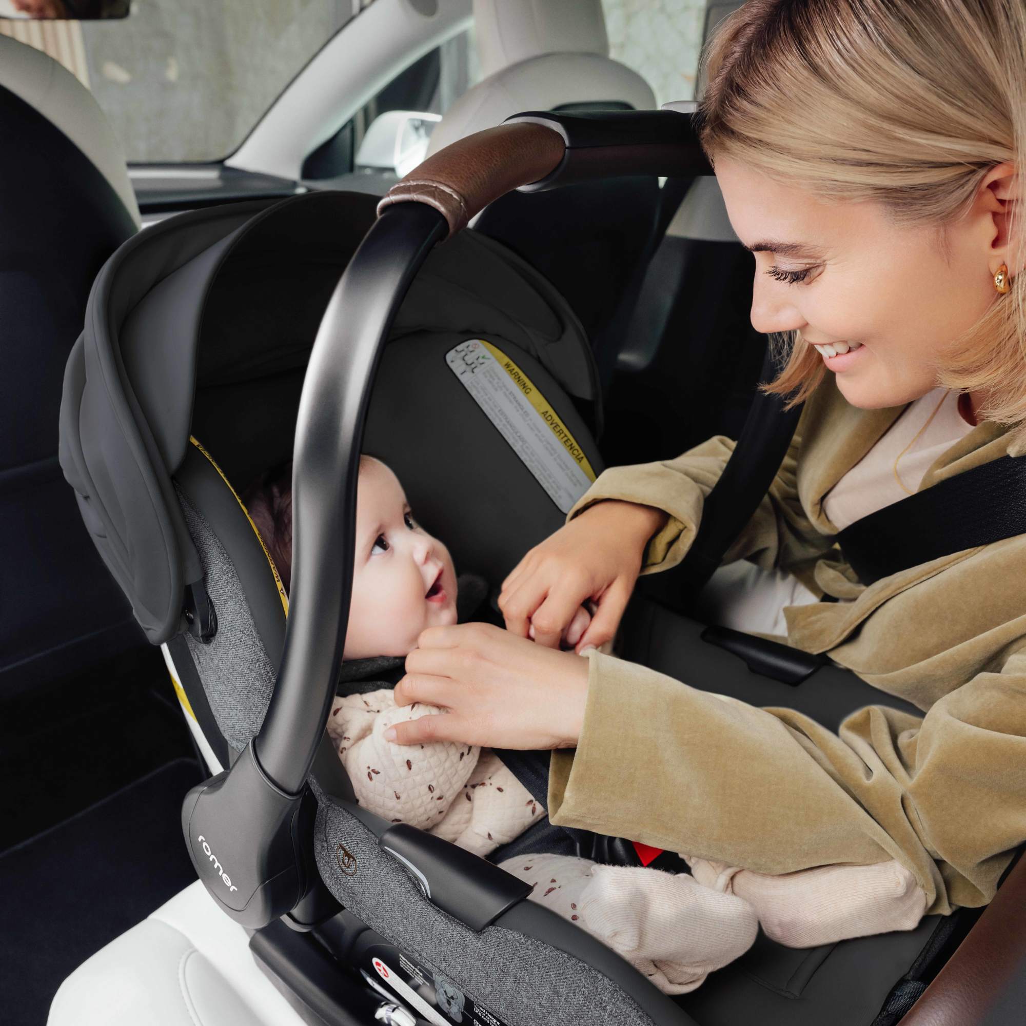 Romer Juni Infant Car Seat + Tura Stroller Travel System