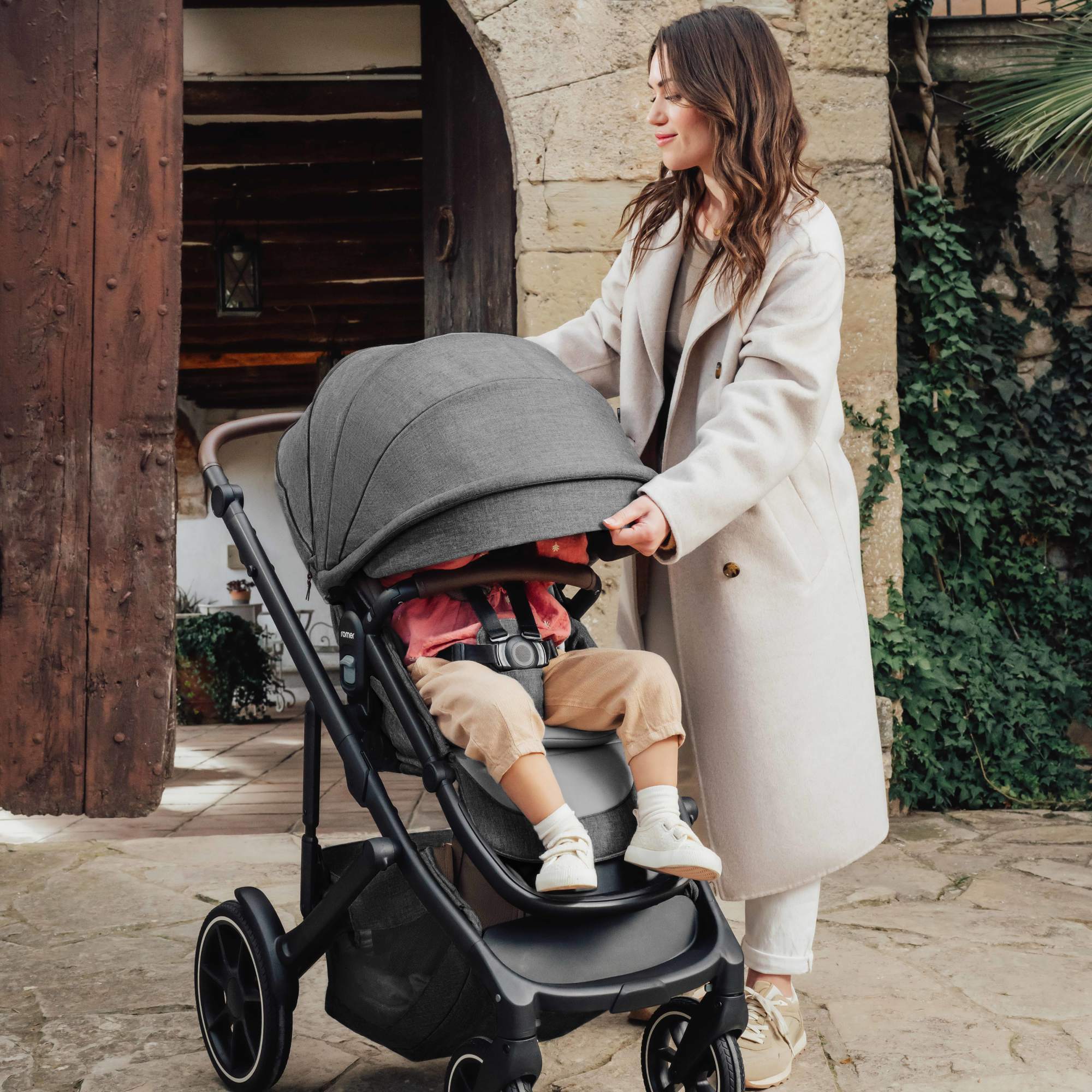 Romer Juni Infant Car Seat + Tura Stroller Travel System